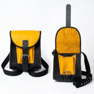 Morral de cuero para trabajo en altura en color amarillo y negro, mostrado cerrado y abierto con correa de nylon y hebilla metálica.